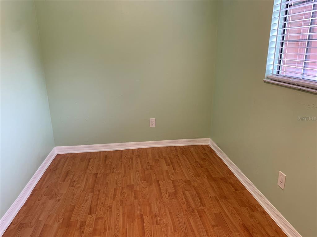 5754 Southwest 8th Place Gainesville, FL 32607 - Photo 19 of 29 a view of wooden floor in a bathroom