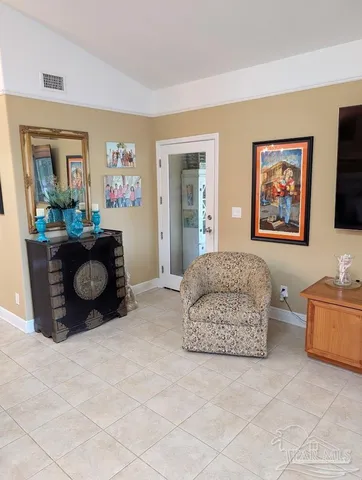 a bedroom with furniture and a bed