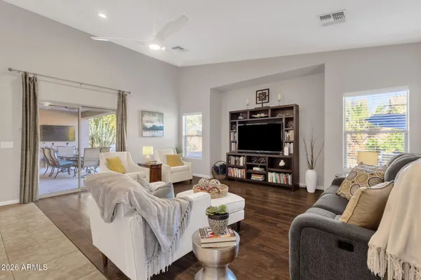 a bathroom with a tub shower and sink