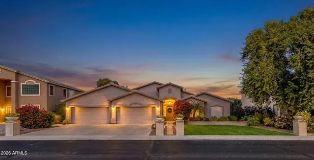 front view of a house with a yard
