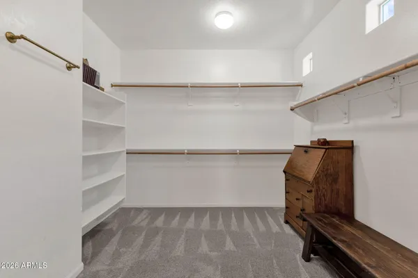 a bathroom with a shower and toilet