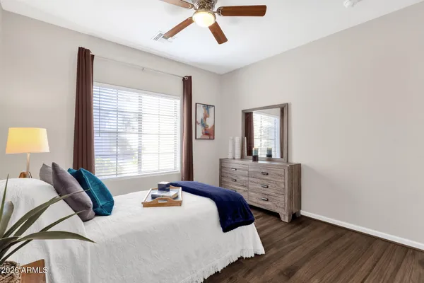 a small pool with a lawn chairs