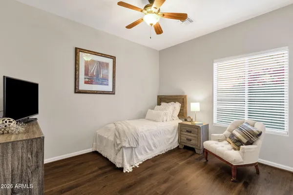 a swimming pool with outdoor seating and yard