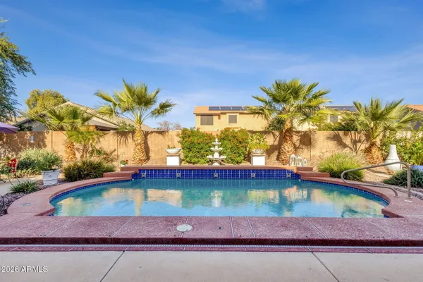 a view of a street with a building in the background