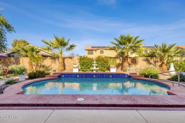 a view of a street with a building in the background