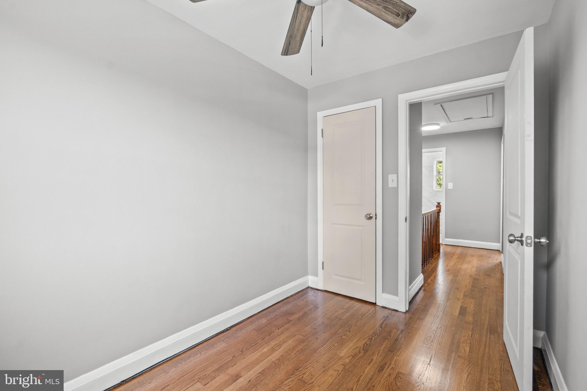 2214 Hawthorne Road Baltimore, MD 21220 - Photo 22 of 28 a view of a hallway with wooden floor