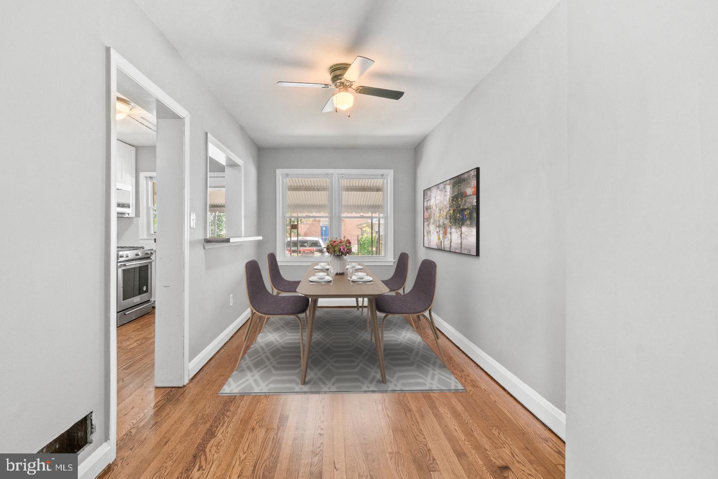 2214 Hawthorne Road Baltimore, MD 21220 - Photo 3 of 28 a living room with furniture and a wooden floor