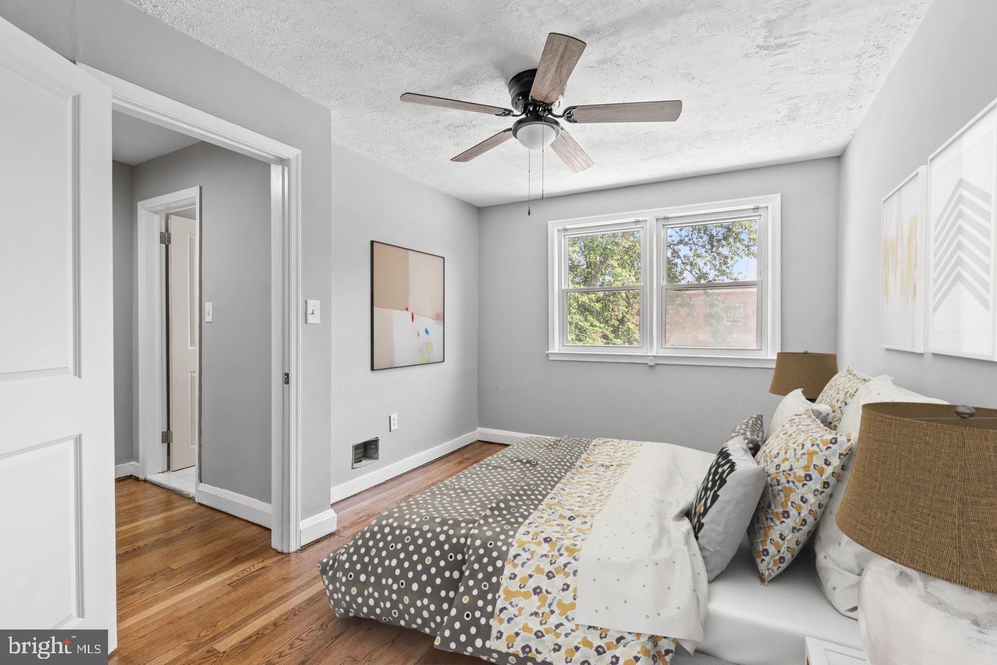 2214 Hawthorne Road Baltimore, MD 21220 - Photo 5 of 28 a bedroom with a bed and a window