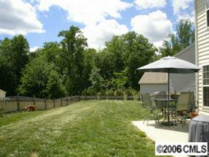 2341 Mirage Place Fort Mill, SC 29708 - Photo 8 of 8 a view of patio with a table and chairs under an umbrella