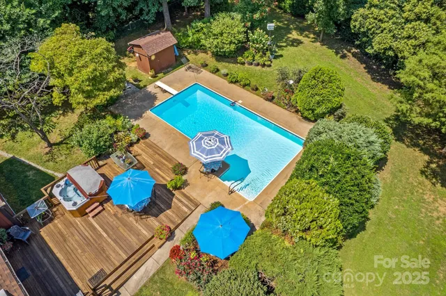 a view of a chairs and table on the wooden floor