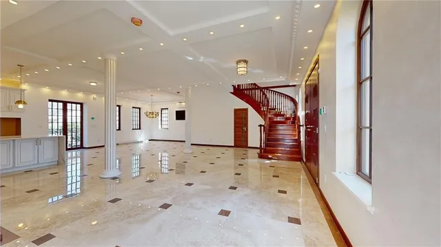 a bathroom with a glass door shower