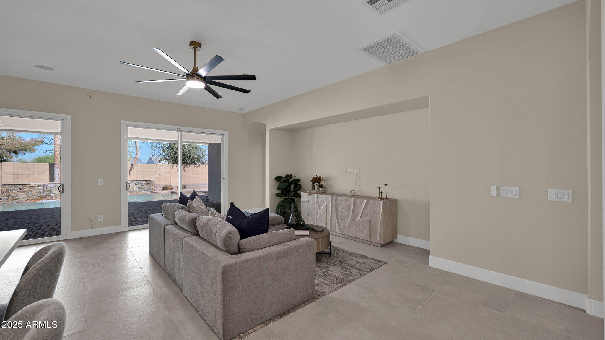 4060 East Canyon Way Chandler, AZ 85249 - Photo 13 of 55 a living room with furniture and a large window