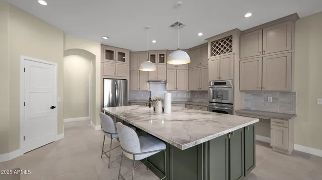 a bathroom with a granite countertop sink mirror and double
