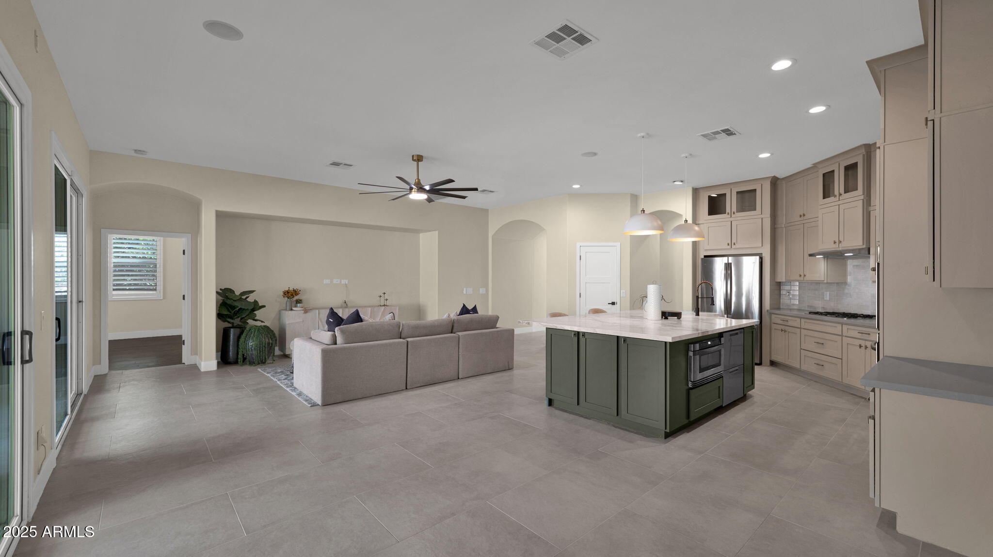 4060 East Canyon Way Chandler, AZ 85249 - Photo 23 of 55 a large white kitchen with cabinets and stainless steel appliances