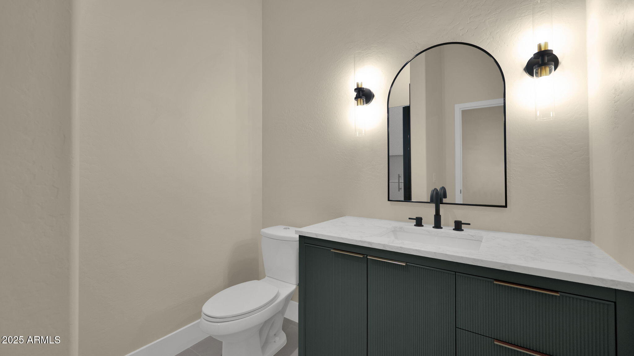 4060 East Canyon Way Chandler, AZ 85249 - Photo 37 of 55 a bathroom with a sink and a mirror