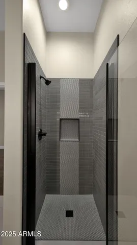 an aerial view of residential houses with outdoor space and river