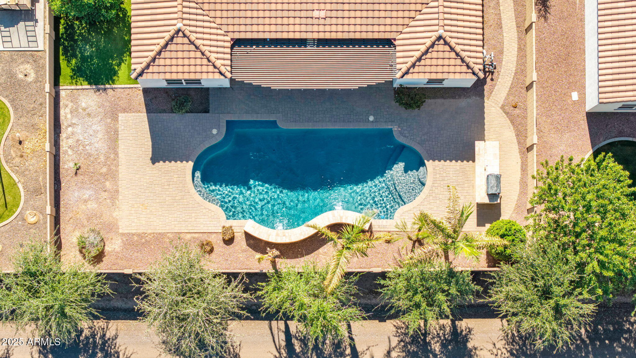4060 East Canyon Way Chandler, AZ 85249 - Photo 47 of 55 an aerial view of a house with swimming pool and porch