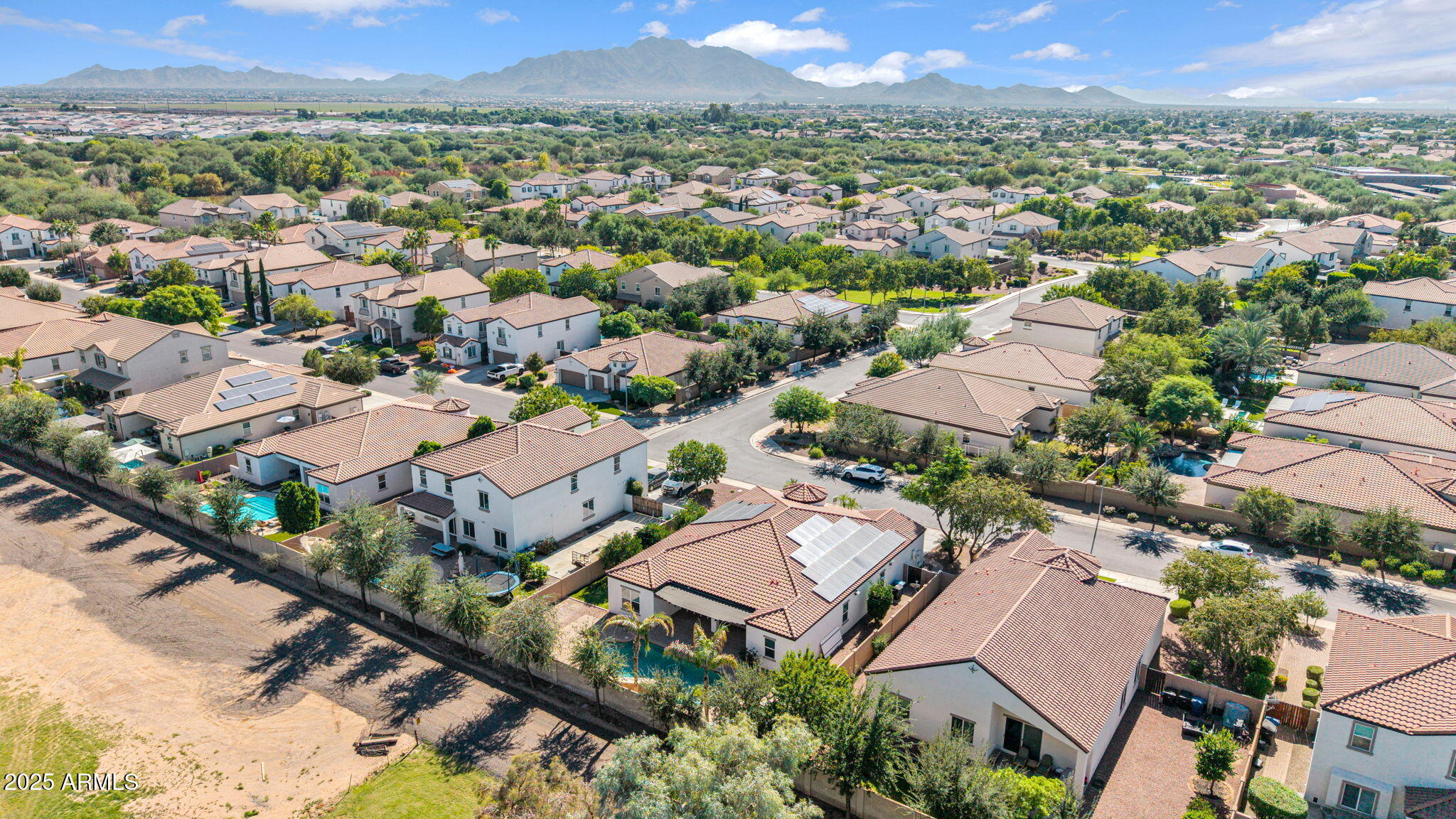 4060 East Canyon Way Chandler, AZ 85249 - Photo 49 of 55 an aerial view of a city with lots of residential buildings