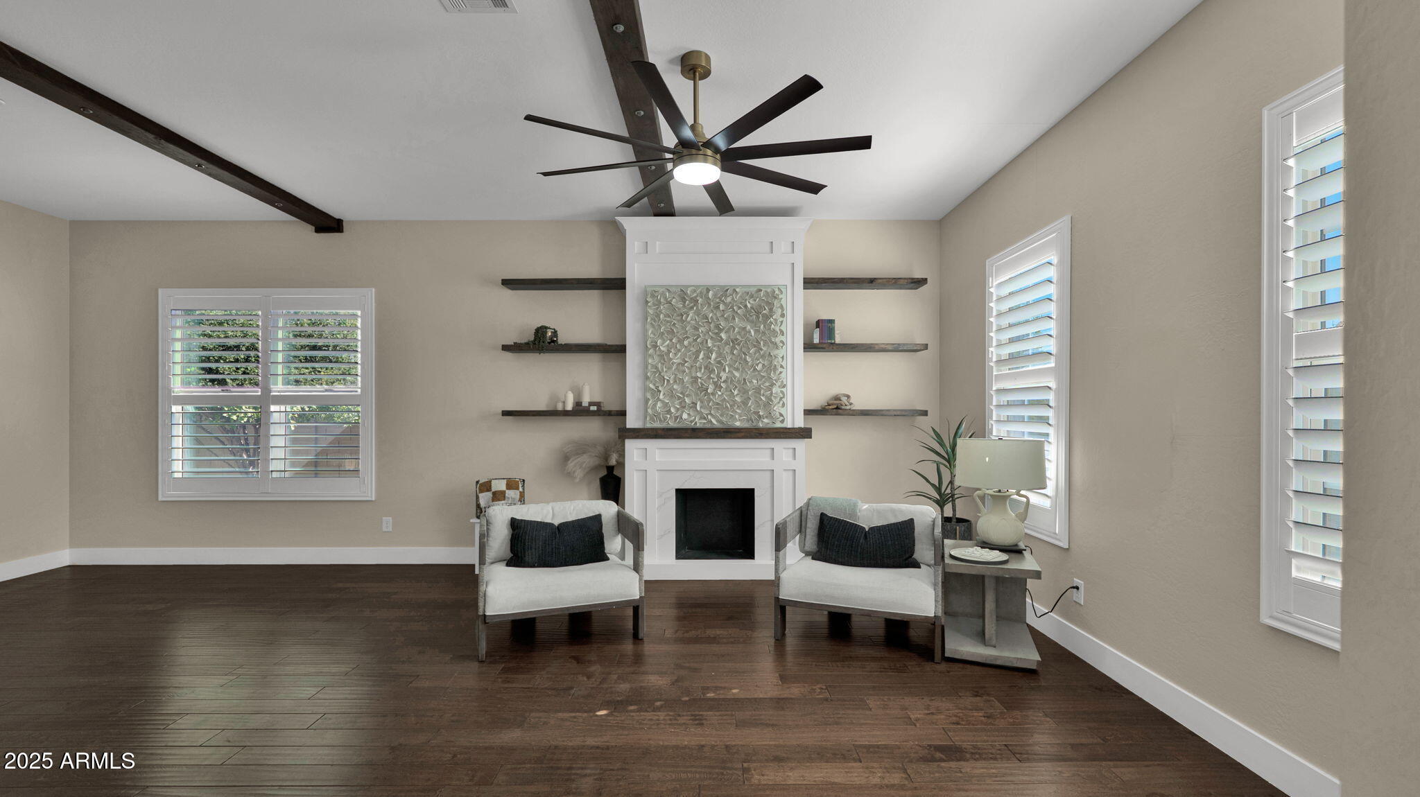 4060 East Canyon Way Chandler, AZ 85249 - Photo 6 of 55 a living room with furniture and a fireplace