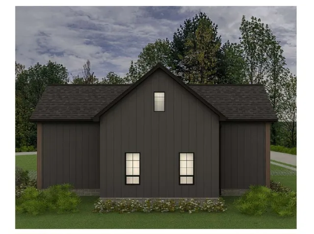 a front view of a house with yard