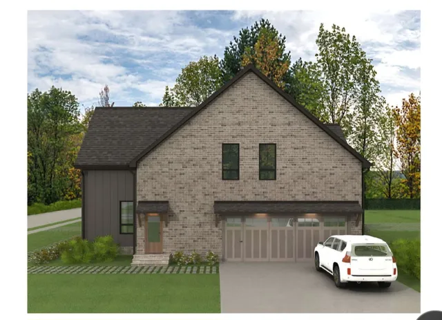 a aerial view of a house with a yard