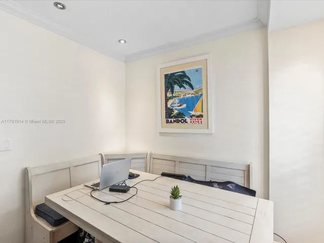 a view of a workspace with furniture