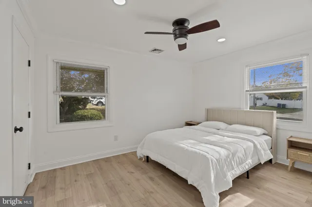 a view of empty room with ceiling fan