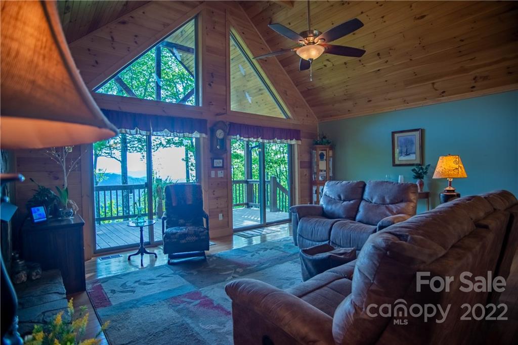 603 Wild Turkey Road Ferguson, NC 28624 - Photo 11 of 46 a living room with furniture and a window