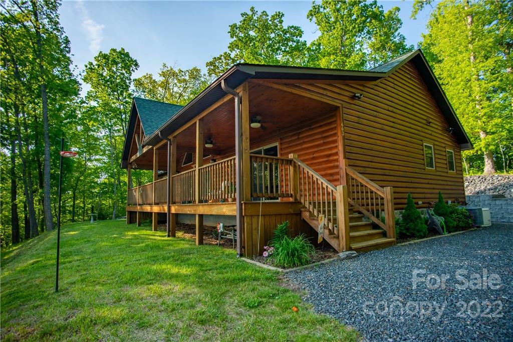 603 Wild Turkey Road Ferguson, NC 28624 - Photo 13 of 46 a view of a house with a yard