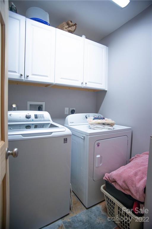 603 Wild Turkey Road Ferguson, NC 28624 - Photo 25 of 46 a utility room with dryer and washer