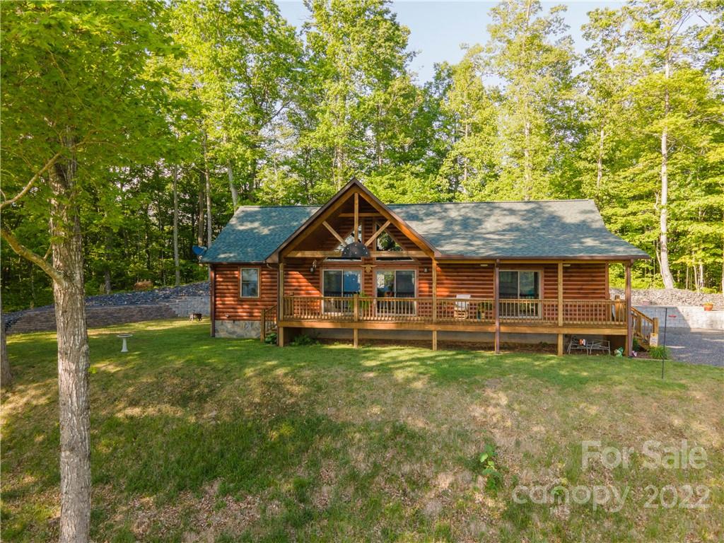 603 Wild Turkey Road Ferguson, NC 28624 - Photo 40 of 46 front view of a house with a yard