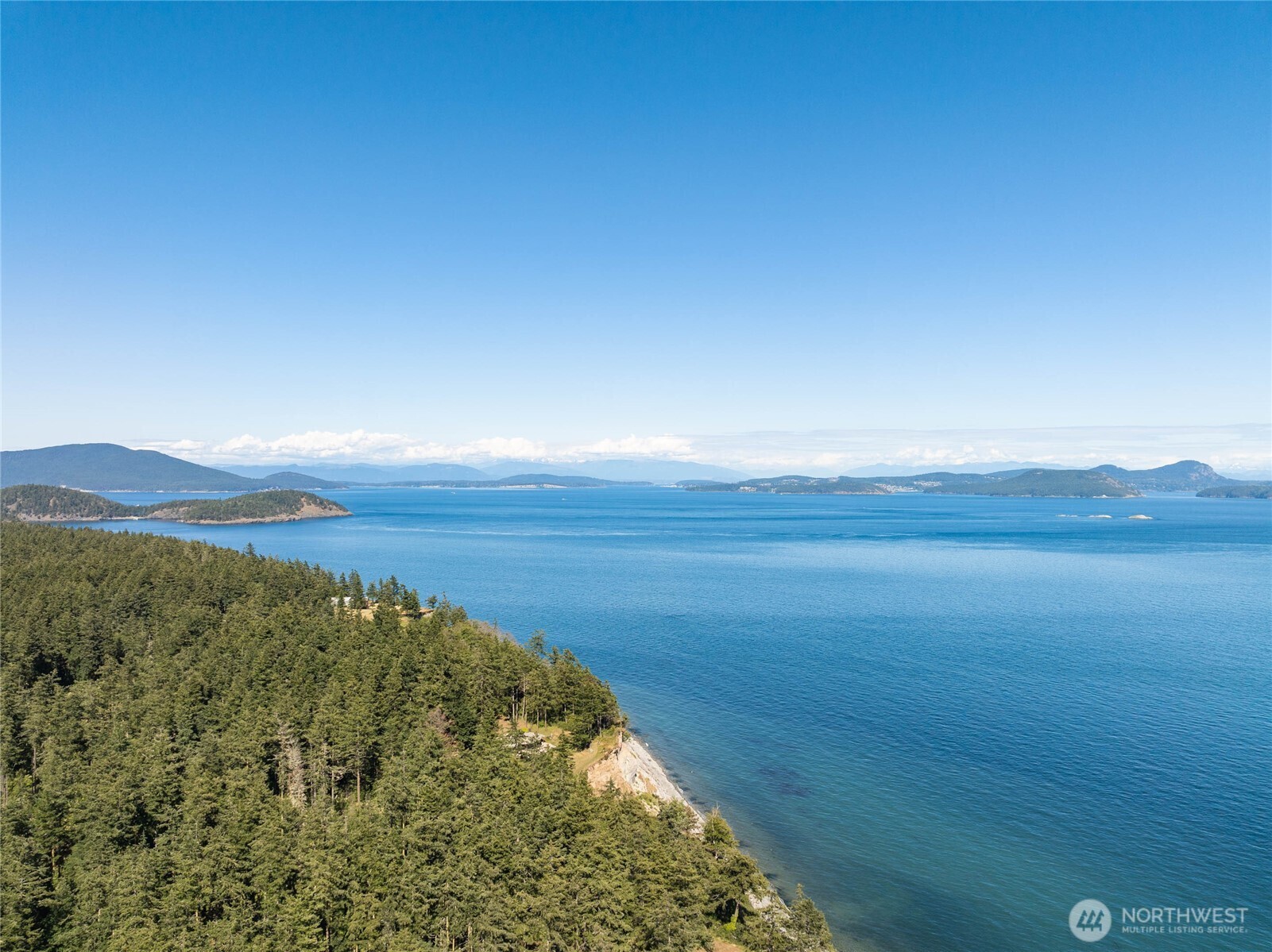 3 Decatur Beach Lane Anacortes, WA 98221 - Photo 2 of 8 a view of ocean with a mountain