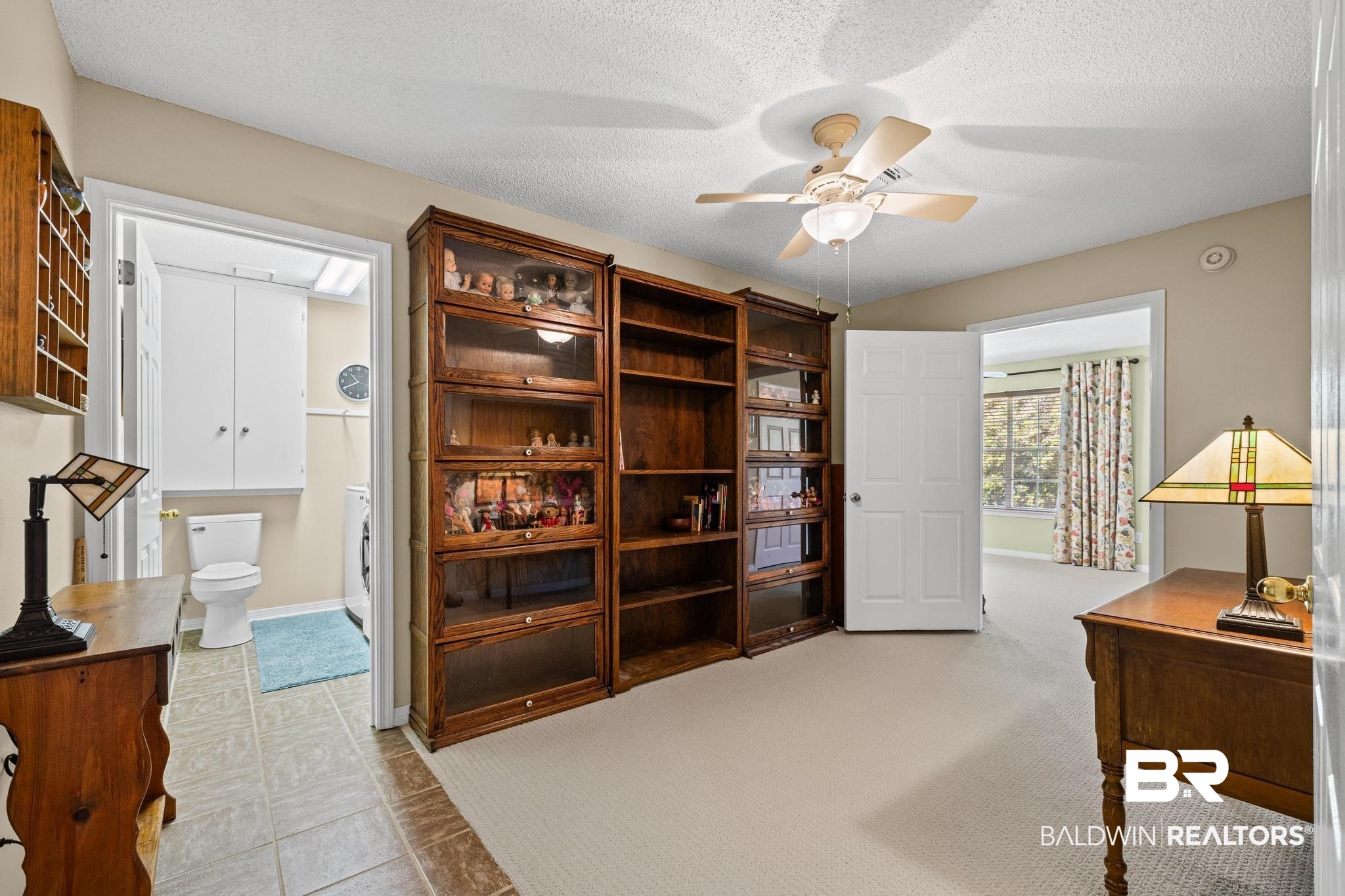 2881 Eslava Circle Lillian, AL 36549 - Photo 14 of 58 Office featuring a ceiling fan, a textured ceiling, and light carpet
