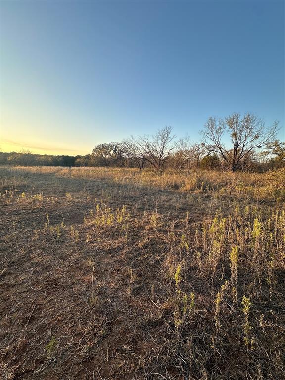 80 Ranch Bangs Tx 76823 Ranch Bangs, TX 76823 - Photo 15 of 40 a view of a lake with a mountain