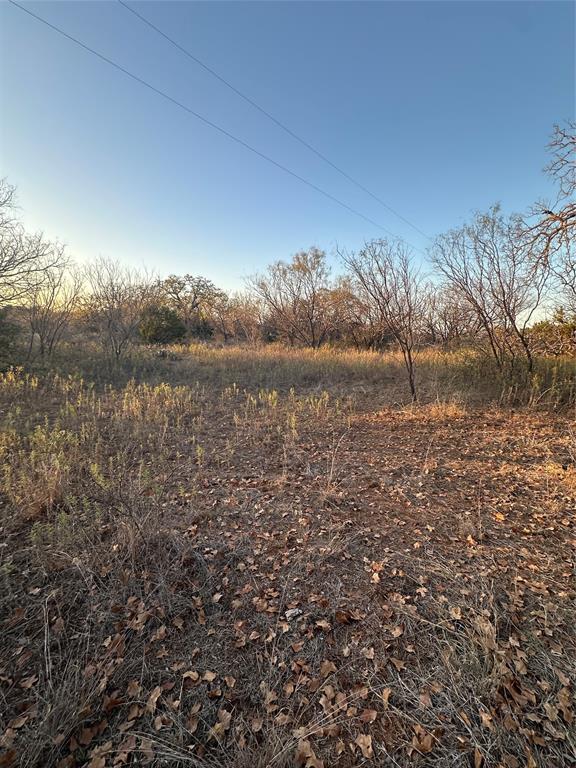 80 Ranch Bangs Tx 76823 Ranch Bangs, TX 76823 - Photo 16 of 40 a view of a lake with houses
