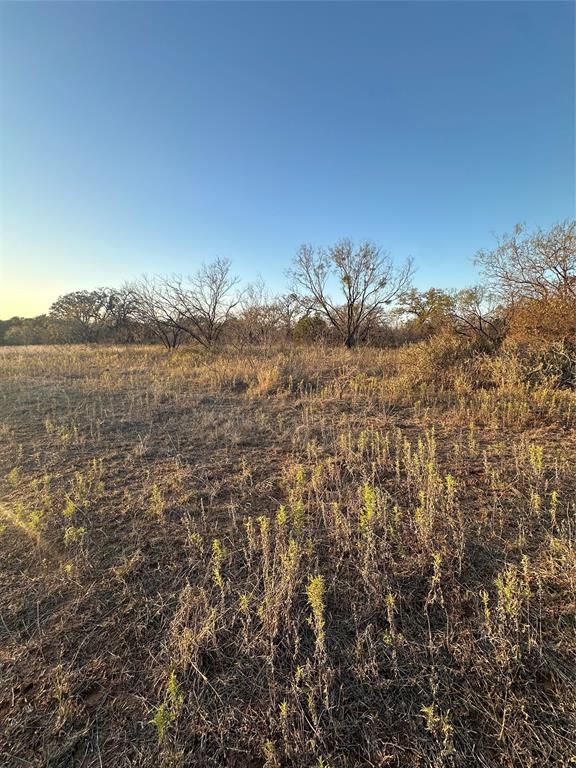 80 Ranch Bangs Tx 76823 Ranch Bangs, TX 76823 - Photo 30 of 40 a view of a lake with a mountain
