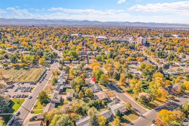 an aerial view of residential building with parking space