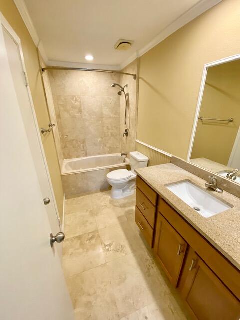 605 Colonial Drive, Unit 5 Fort Walton Beach, FL 32547 - Photo 13 of 31 a bathroom with a granite countertop sink toilet and shower