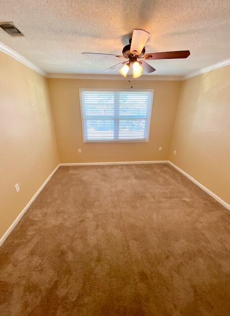 605 Colonial Drive, Unit 5 Fort Walton Beach, FL 32547 - Photo 14 of 31 a view of an empty room and window