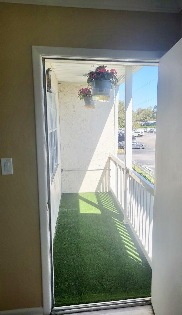 605 Colonial Drive, Unit 5 Fort Walton Beach, FL 32547 - Photo 19 of 31 a view of a porch