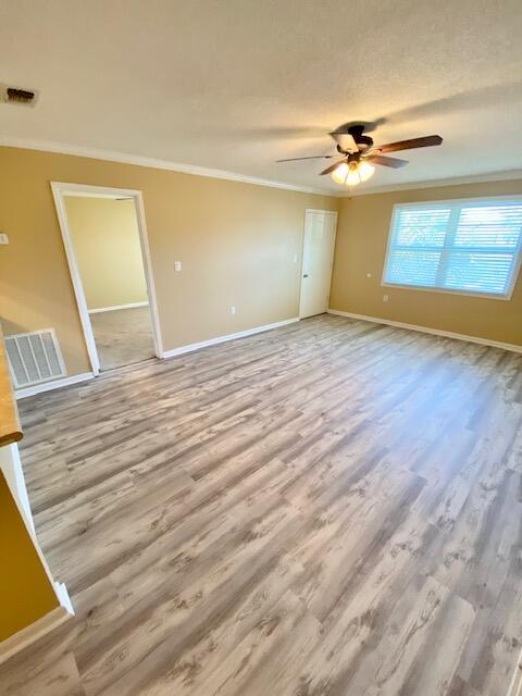 605 Colonial Drive, Unit 5 Fort Walton Beach, FL 32547 - Photo 5 of 31 a view of empty room with wooden floor