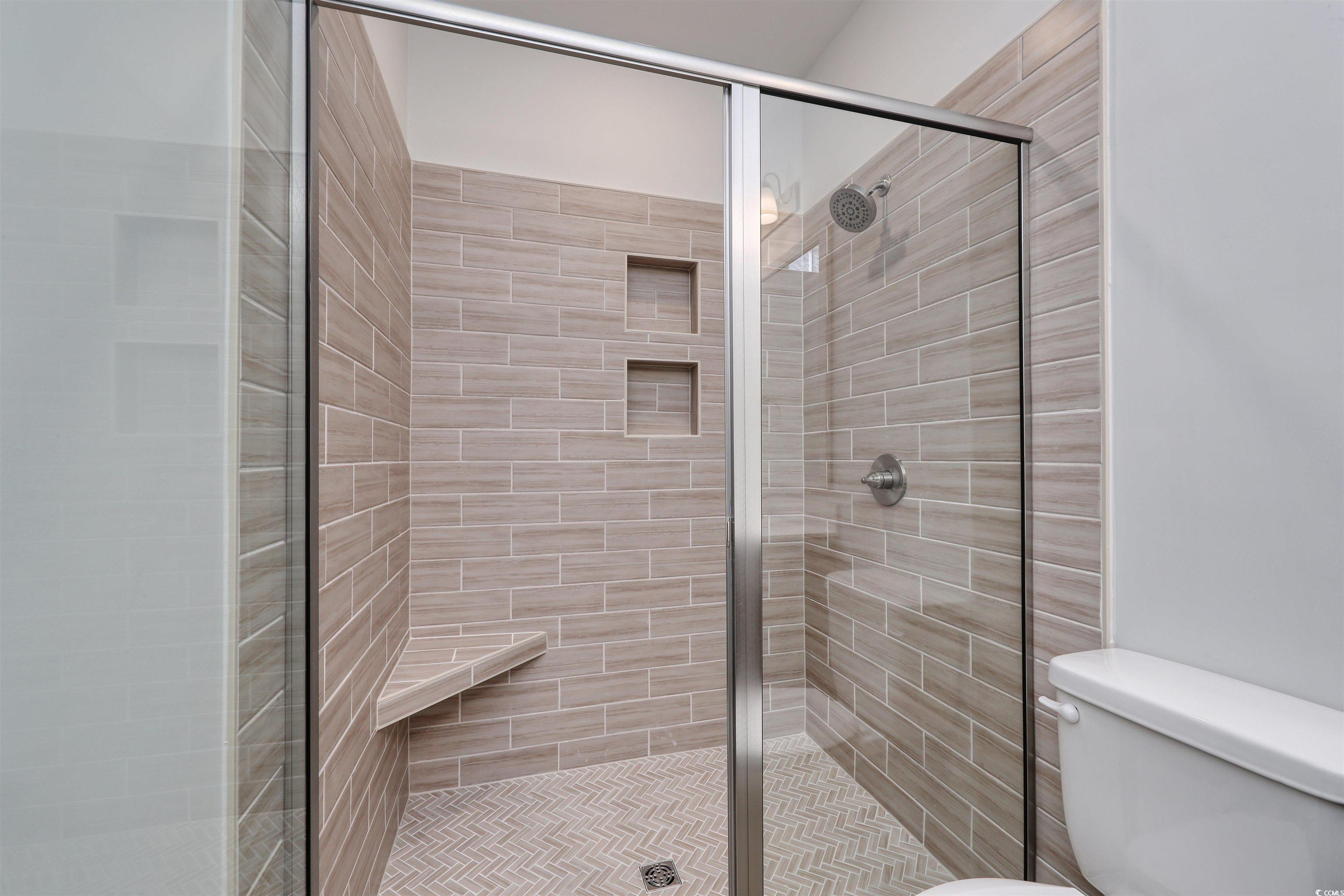 1083 Laconic Drive Myrtle Beach, SC 29588 - Photo 21 of 40 Primary bathroom with a 5'x5' tile shower