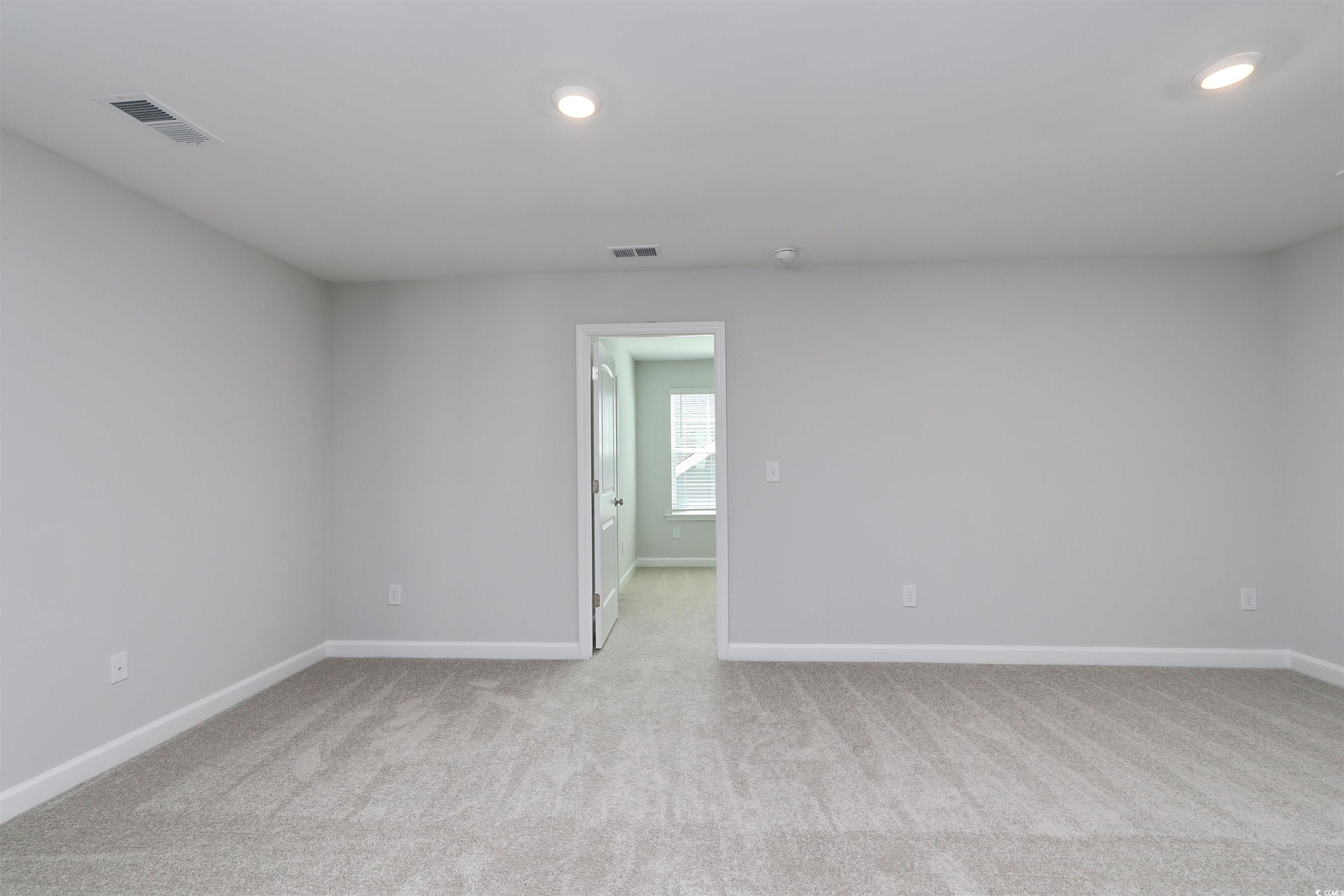 1083 Laconic Drive Myrtle Beach, SC 29588 - Photo 28 of 40 Unfurnished room featuring light colored carpet and recessed lighting