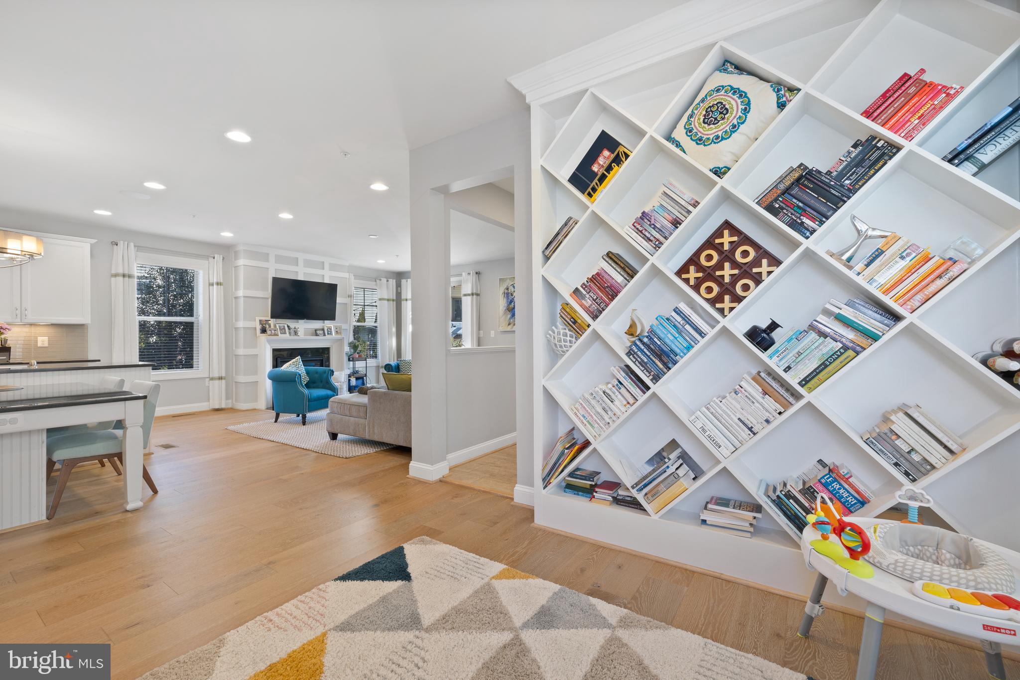 13410 Redspire Drive Silver Spring, MD 20906 - Photo 13 of 43 a room with furniture and a kitchen view