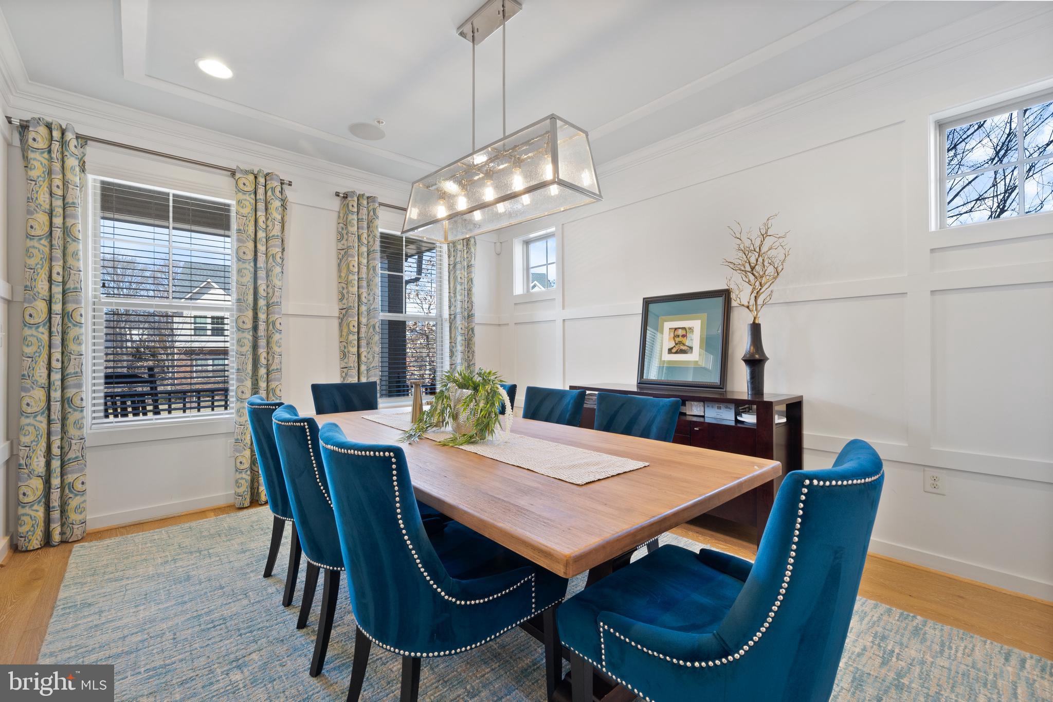 13410 Redspire Drive Silver Spring, MD 20906 - Photo 3 of 43 a view of a dining room with furniture window and wooden floor