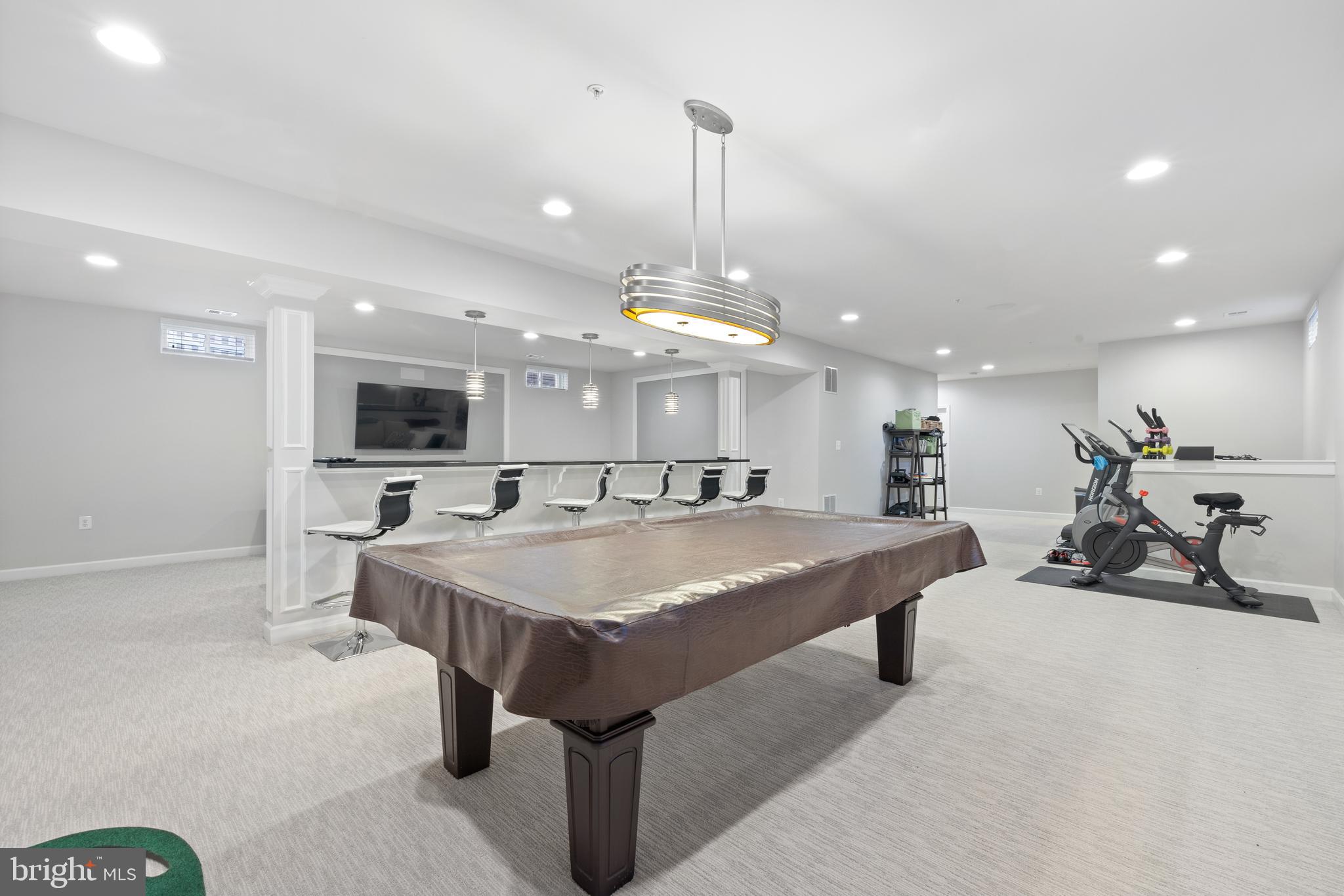 13410 Redspire Drive Silver Spring, MD 20906 - Photo 31 of 43 a large kitchen with a table and chairs