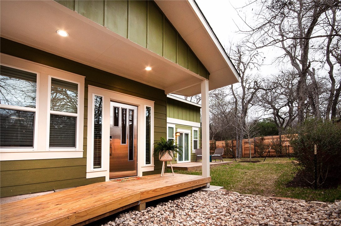 1203 Cometa Street, Unit 2 Austin, TX 78721 - Photo 1 of 1 a view of a house with backyard outdoor seating and hardwood