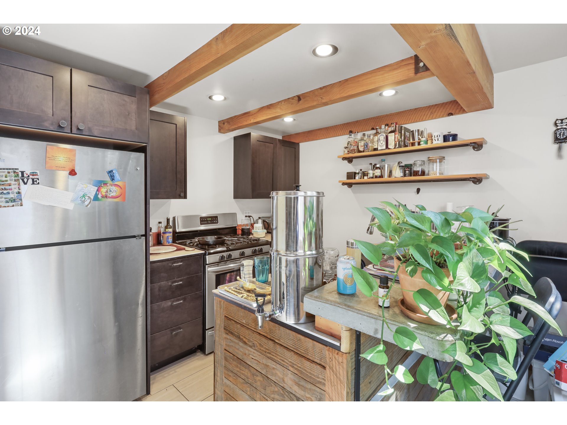 7 Rattlesnake Road White Salmon, WA 98672 - Photo 23 of 41 a kitchen with stainless steel appliances a refrigerator a sink a stove a washer dryer and cabinets