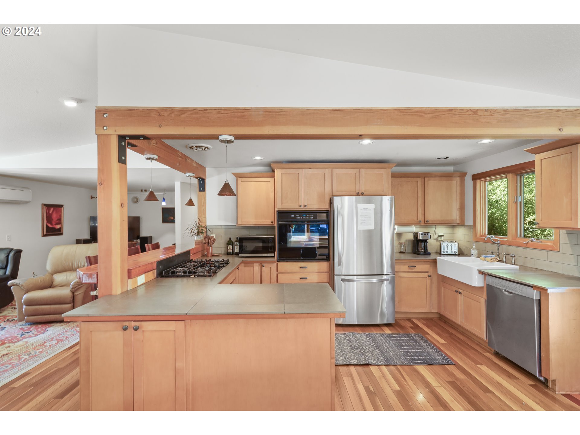 7 Rattlesnake Road White Salmon, WA 98672 - Photo 7 of 41 a kitchen with stainless steel appliances granite countertop a refrigerator and a sink