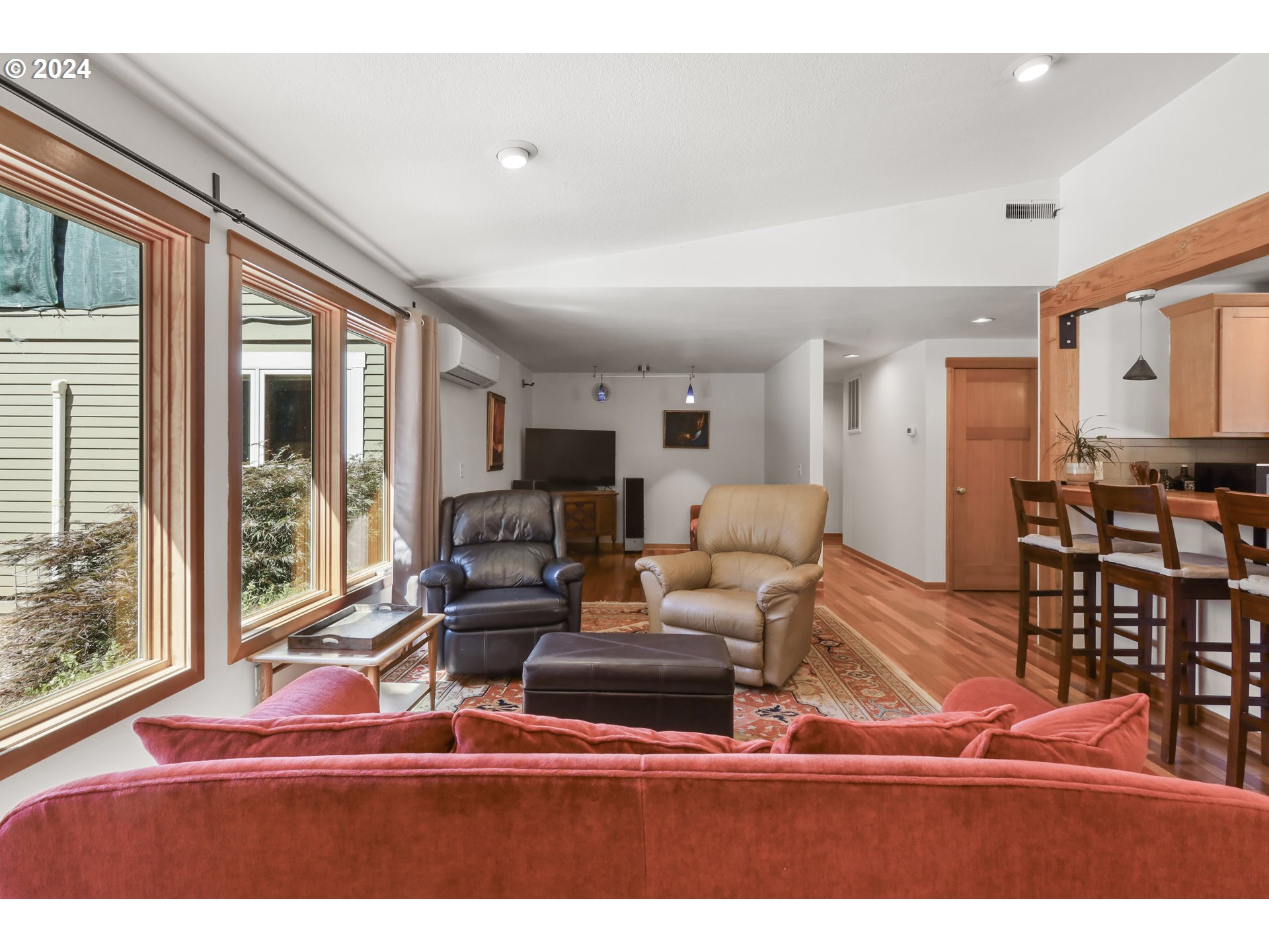 7 Rattlesnake Road White Salmon, WA 98672 - Photo 9 of 41 a living room with furniture a large window and wooden floor
